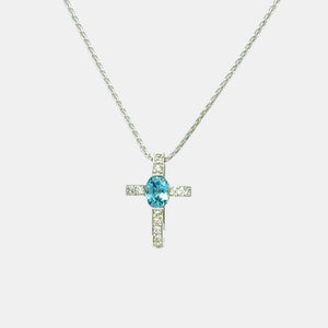 14K White Gold cross pendant with oval blue zircon and natural diamonds
