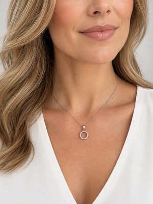 14K white gold diamond circle necklace shown worn at 16 inches
