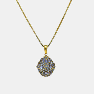 14K Yellow Gold pendant with tanzanites and natural diamond accents

