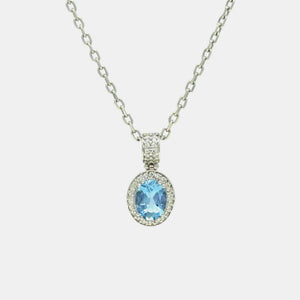 18K White Gold oval aquamarine and natural diamond pendant on 14K White Gold chain
