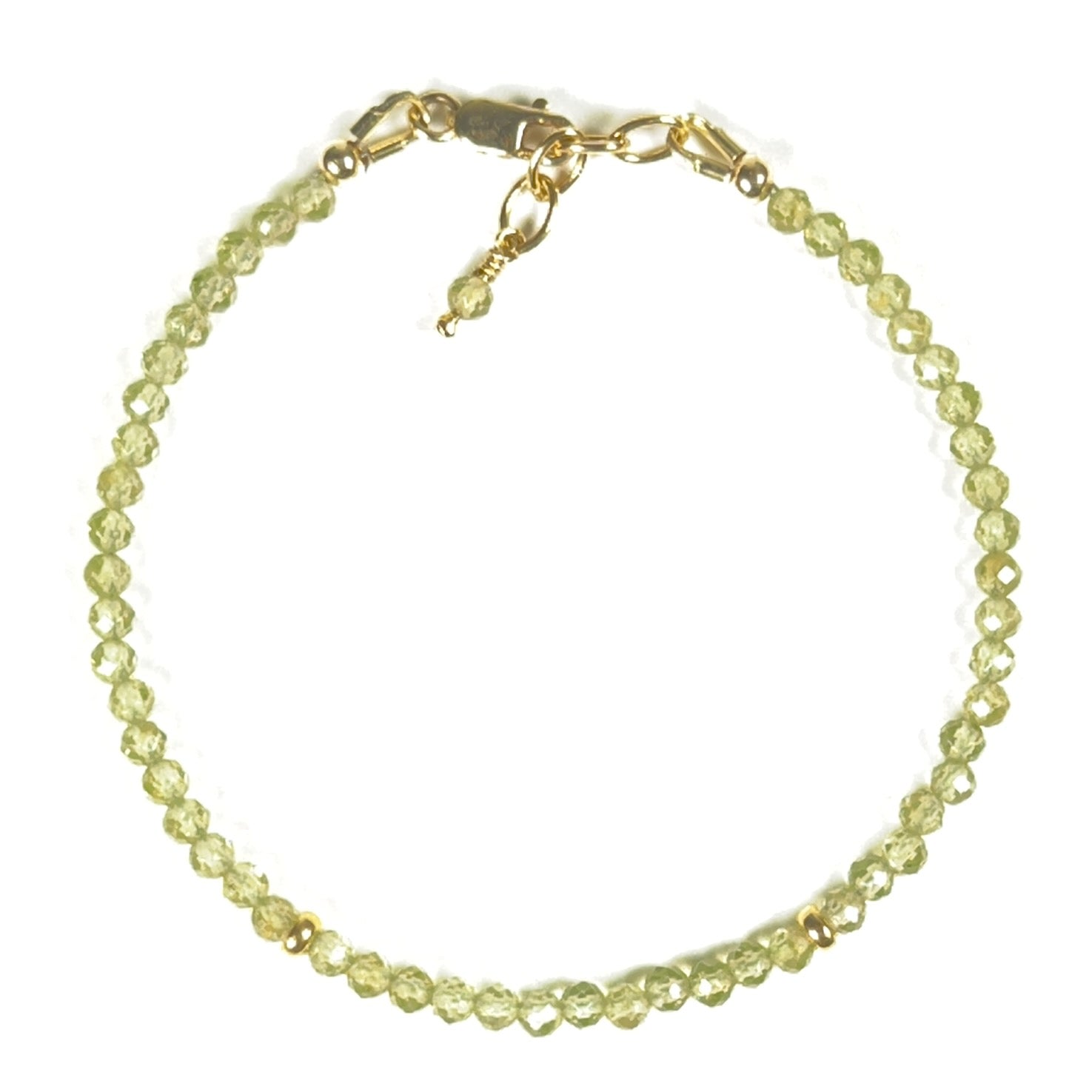 Faceted natural yellowish-green peridot gemstone bracelet with gold-filled accent beads, lobster clasp and chain.