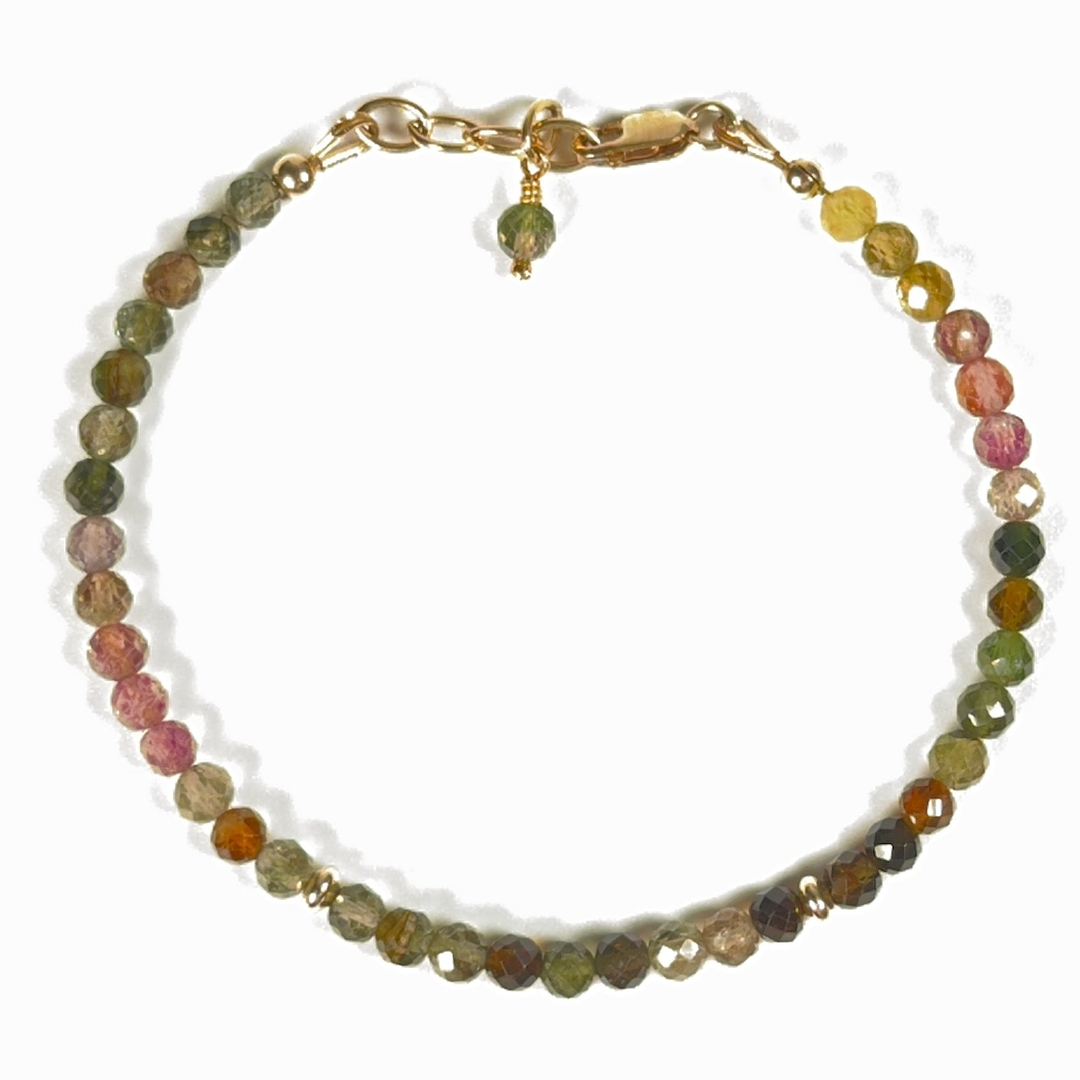 Faceted natural multicolor tourmaline gemstone bracelet in soft pink, green and earthy tones with gold-filled accent beads, lobster clasp and chain.