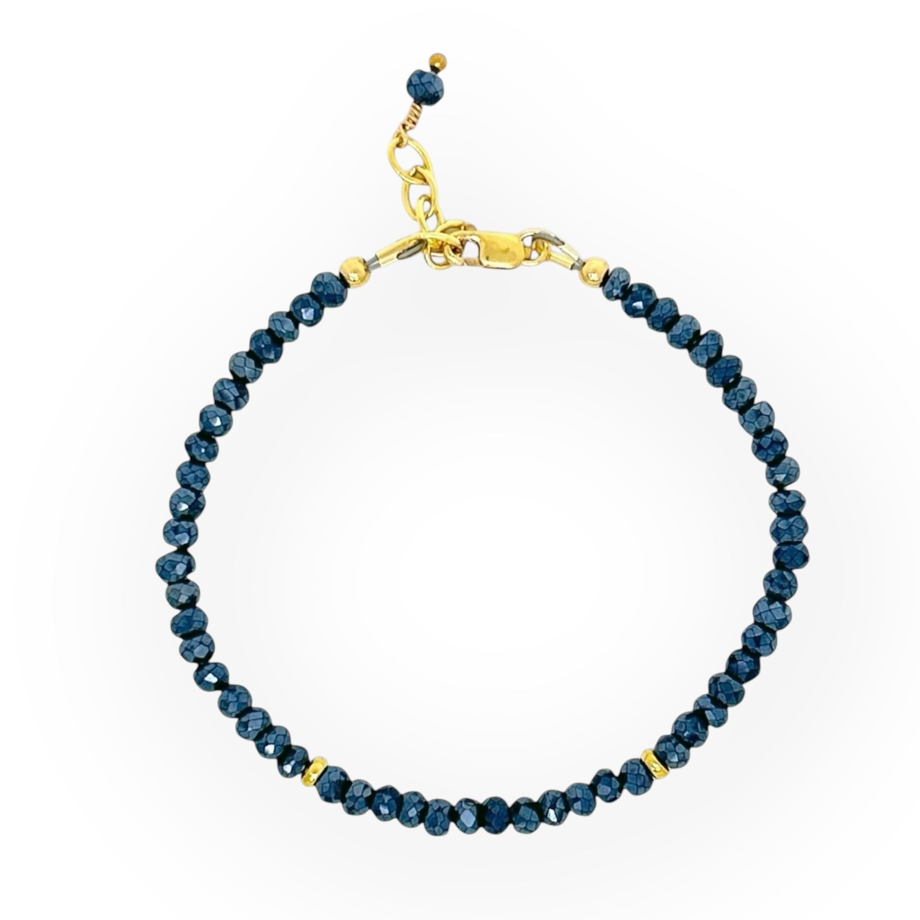 Faceted Dark Blue Sapphire Bracelet