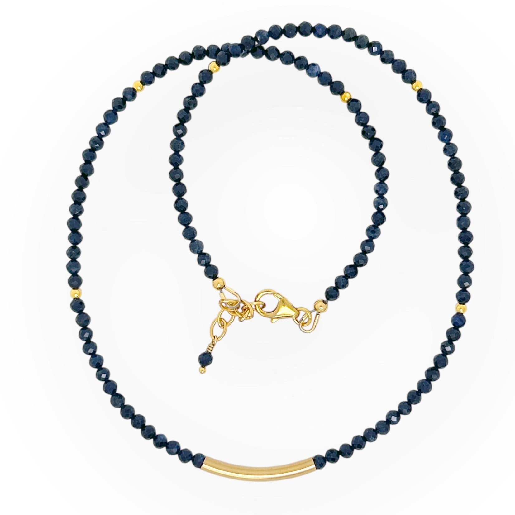 Faceted Dark Blue Sapphire Necklace with Gold Bar