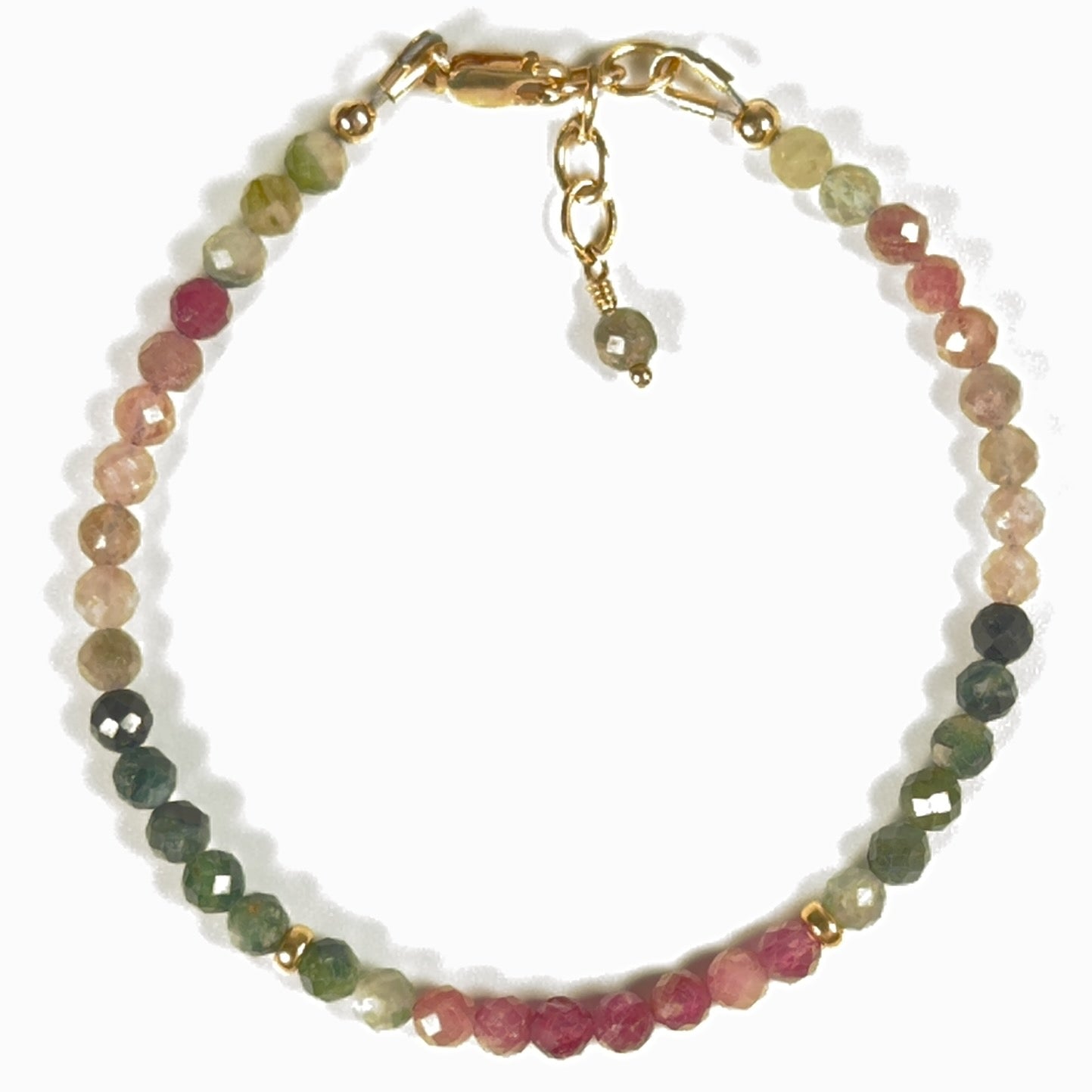 Faceted natural multicolor tourmaline bracelet in pink, green and warm earthy tones with gold-filled accent beads, lobster clasp and chain.