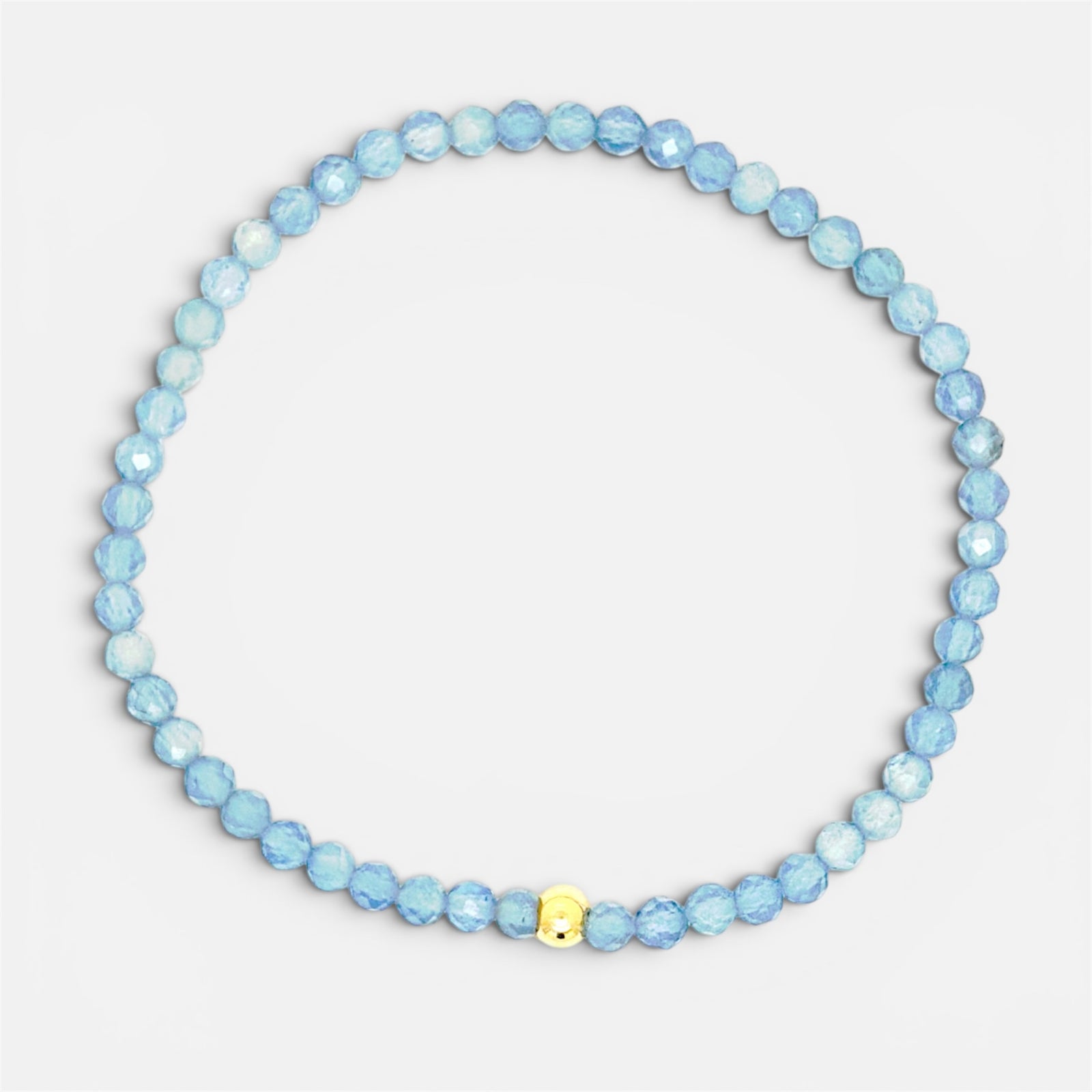 Faceted aquamarine stretch bracelet with gold-filled accent bead