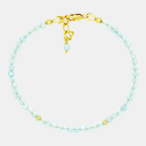 Faceted blue topaz bracelet with gold filled accents and clasp