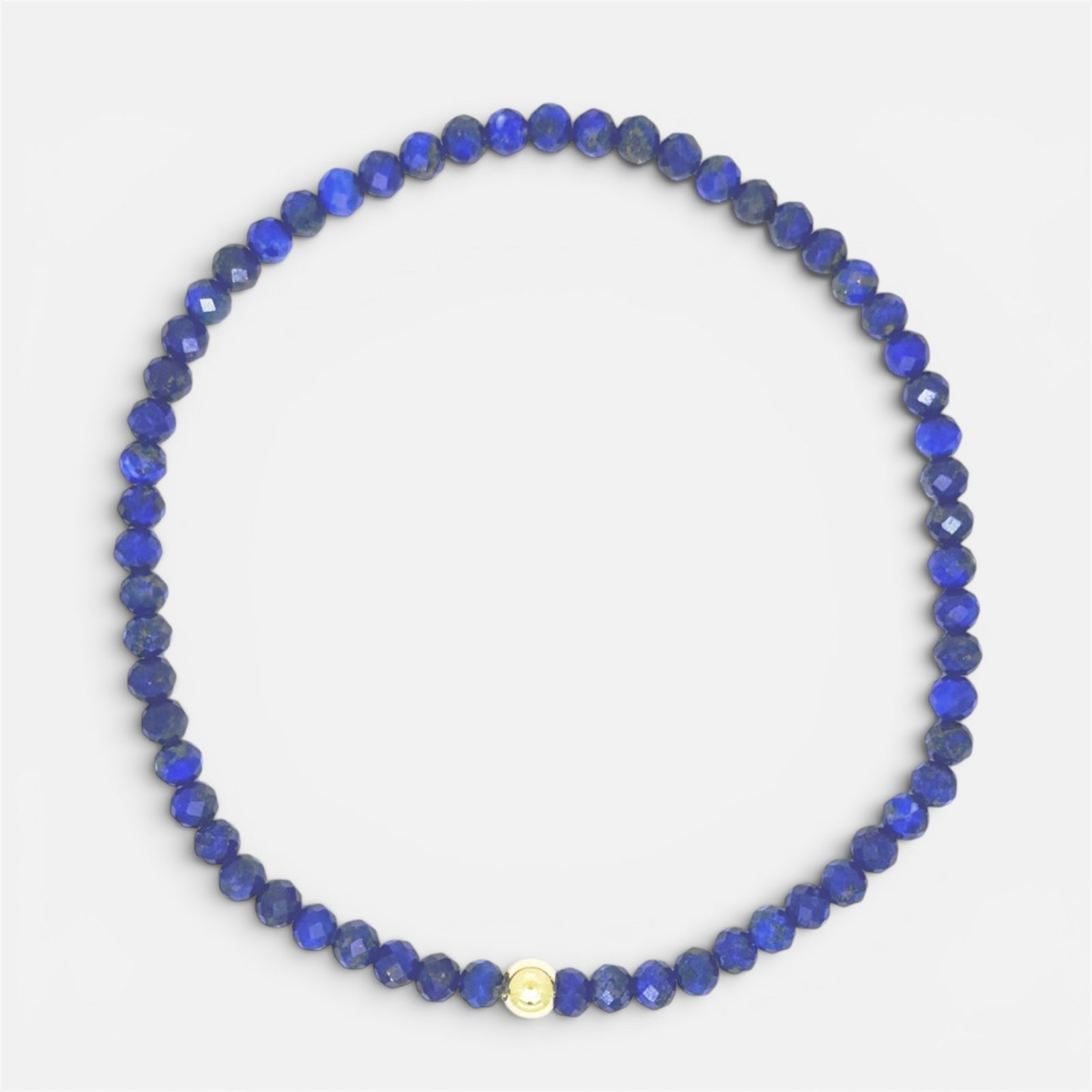 Faceted lapis lazuli stretch bracelet with gold-filled accent bead