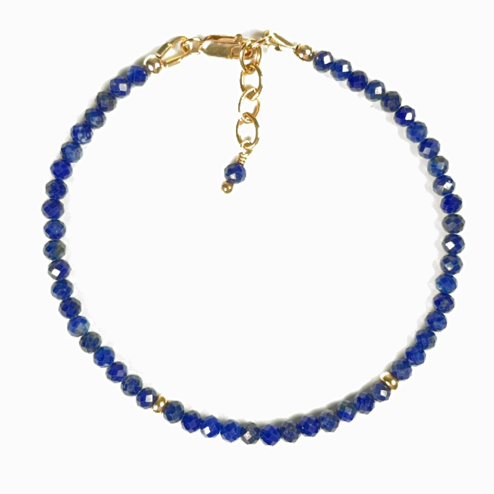 Faceted natural deep blue lapis lazuli gemstone bracelet with gold-filled rondelles, lobster clasp and chain.