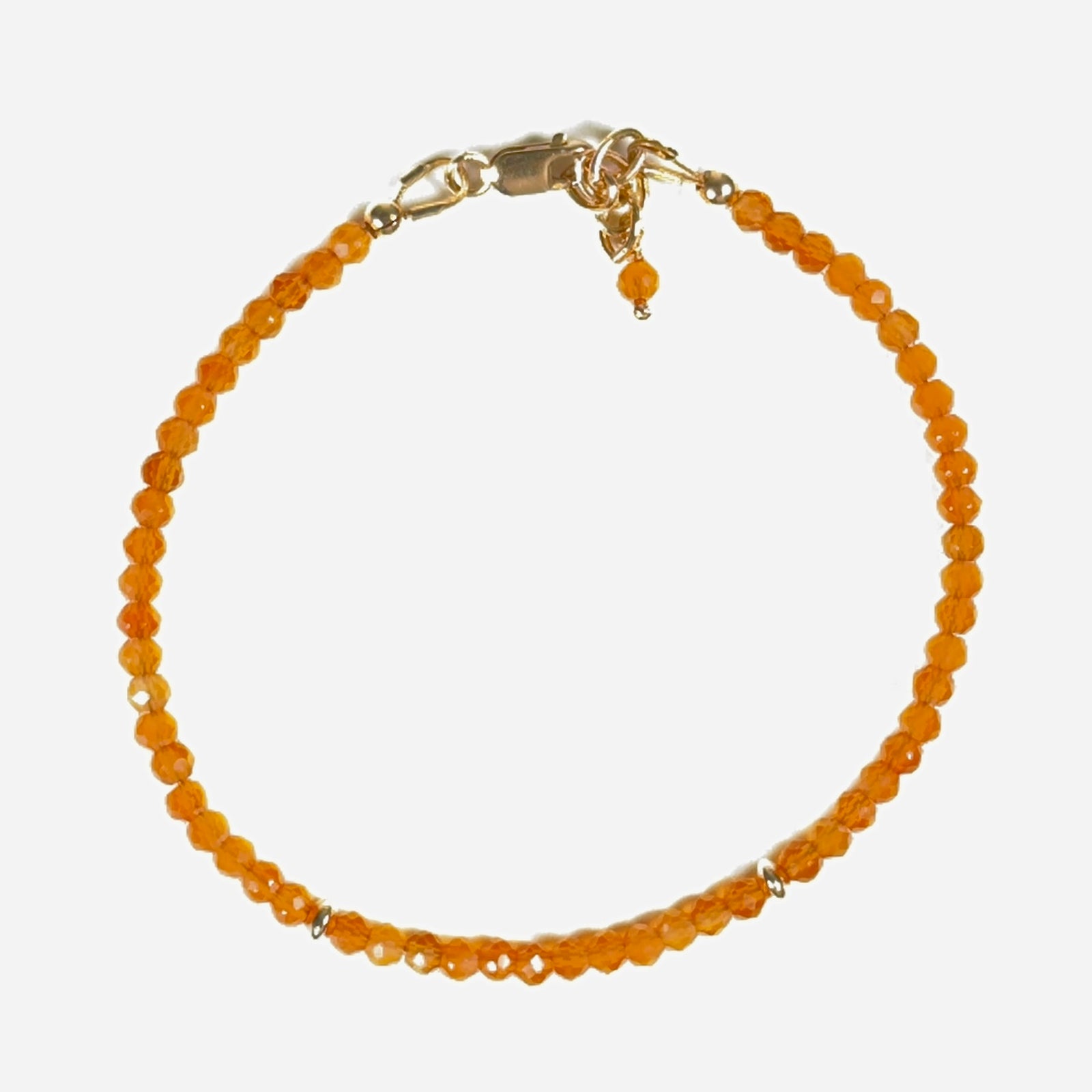 Faceted light orange natural carnelian gemstone bracelet with gold-filled accent beads, lobster clasp and chain.