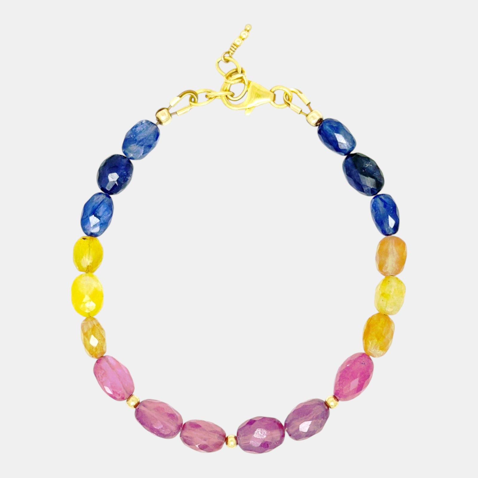 Multicolor sapphire bracelet with large faceted blue, pink, yellow and orange beads and gold-filled accents