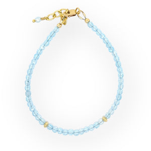 Natural faceted blue topaz bracelet with gold filled accents and lobster clasp
