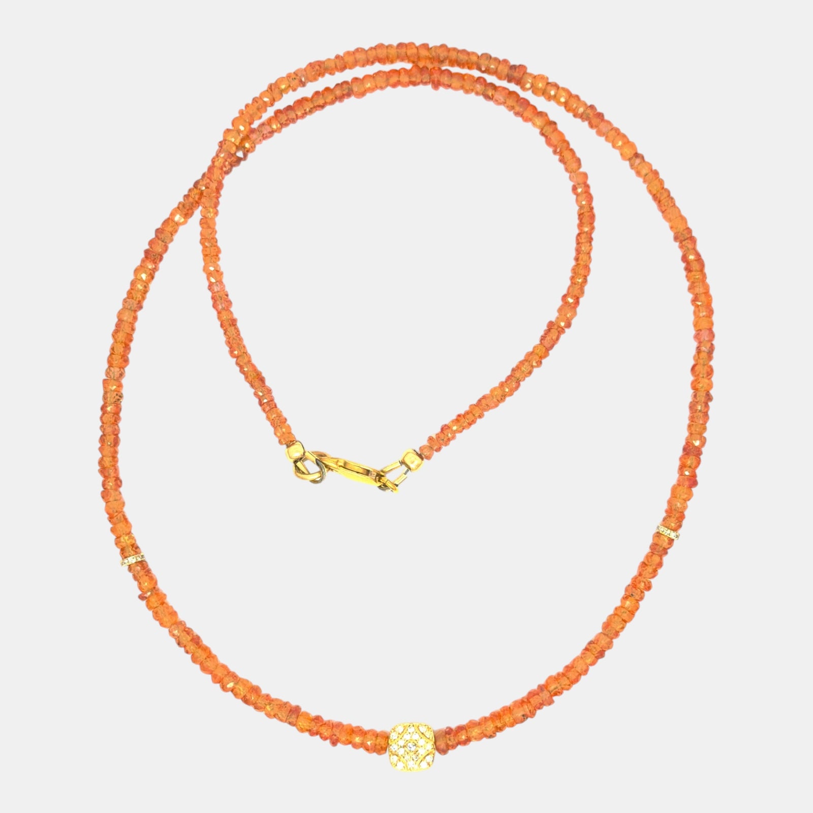Natural orange sapphire necklace with solid 14K yellow gold diamond pavé center
