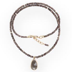 Sapphire necklace with 14K gold bezel-set sapphire pendant and gold filled clasp and chain