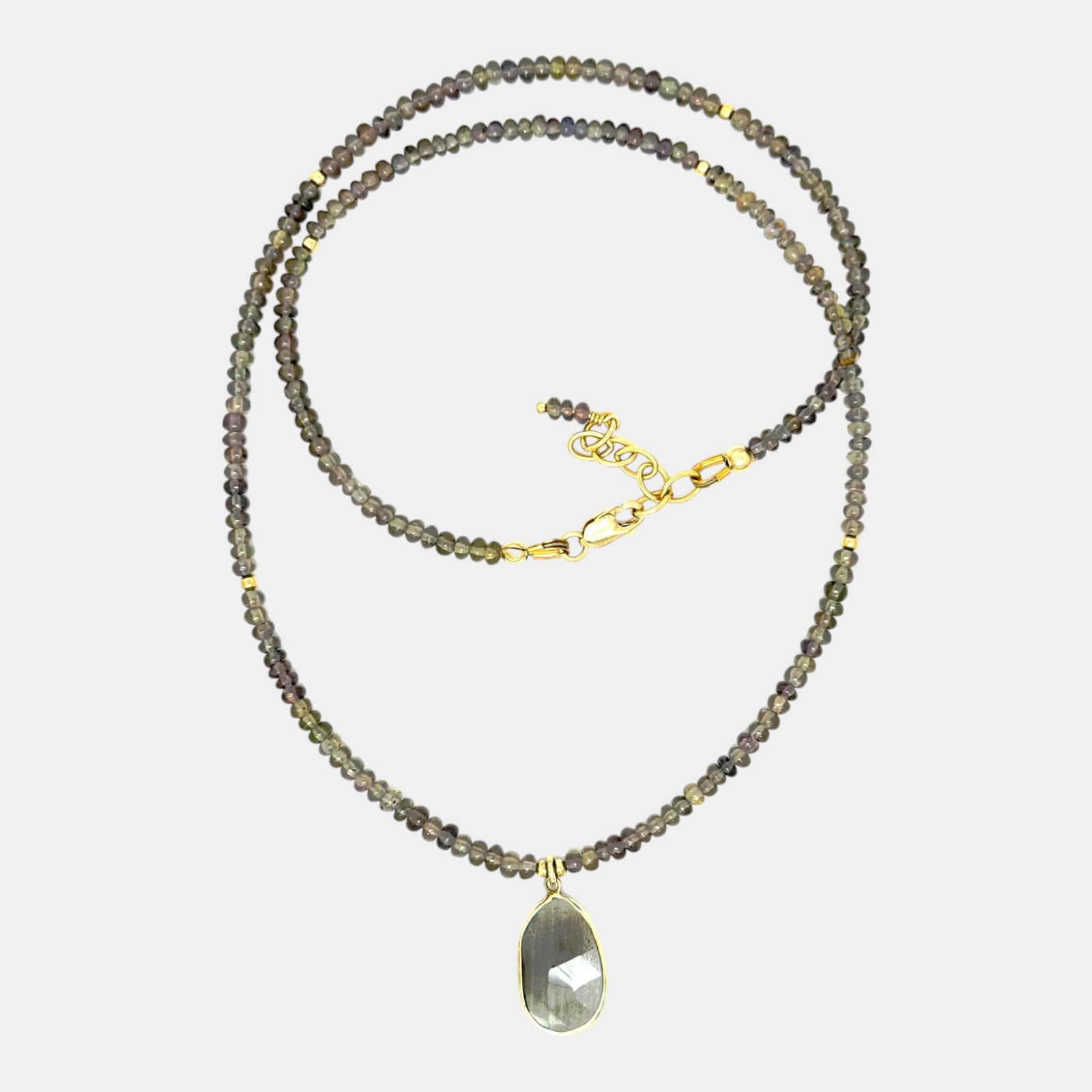 Natural sapphire necklace with sapphire pendant set in solid 14K yellow gold bezel