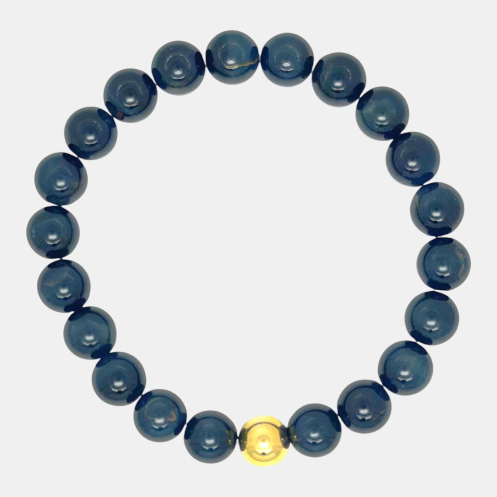 Dark blue hawk’s eye slip-on bracelet with gold-filled accent bead