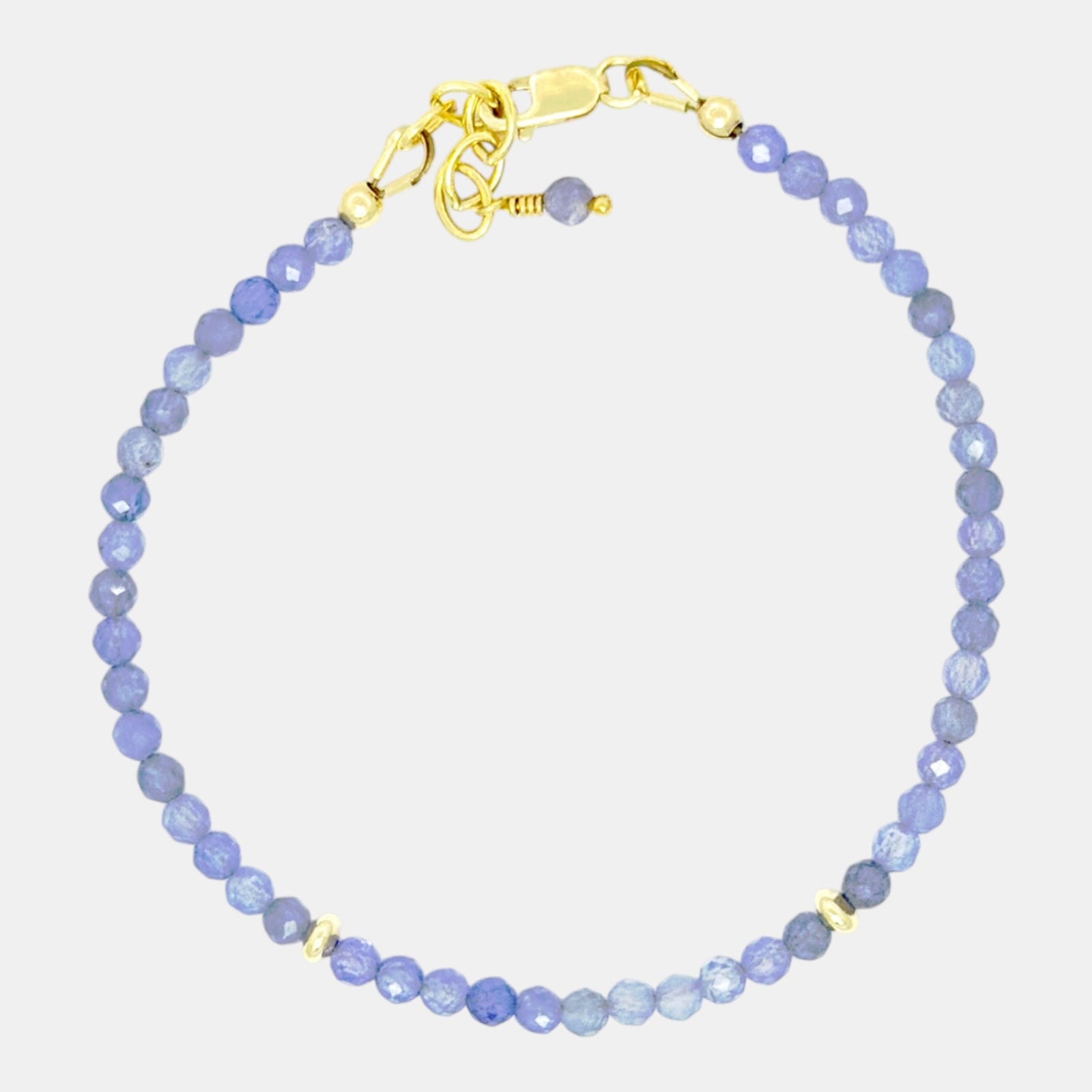 Natural faceted tanzanite bracelet with gold filled accents and lobster clasp
